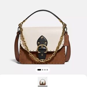 coach beat saddle bag with rivets